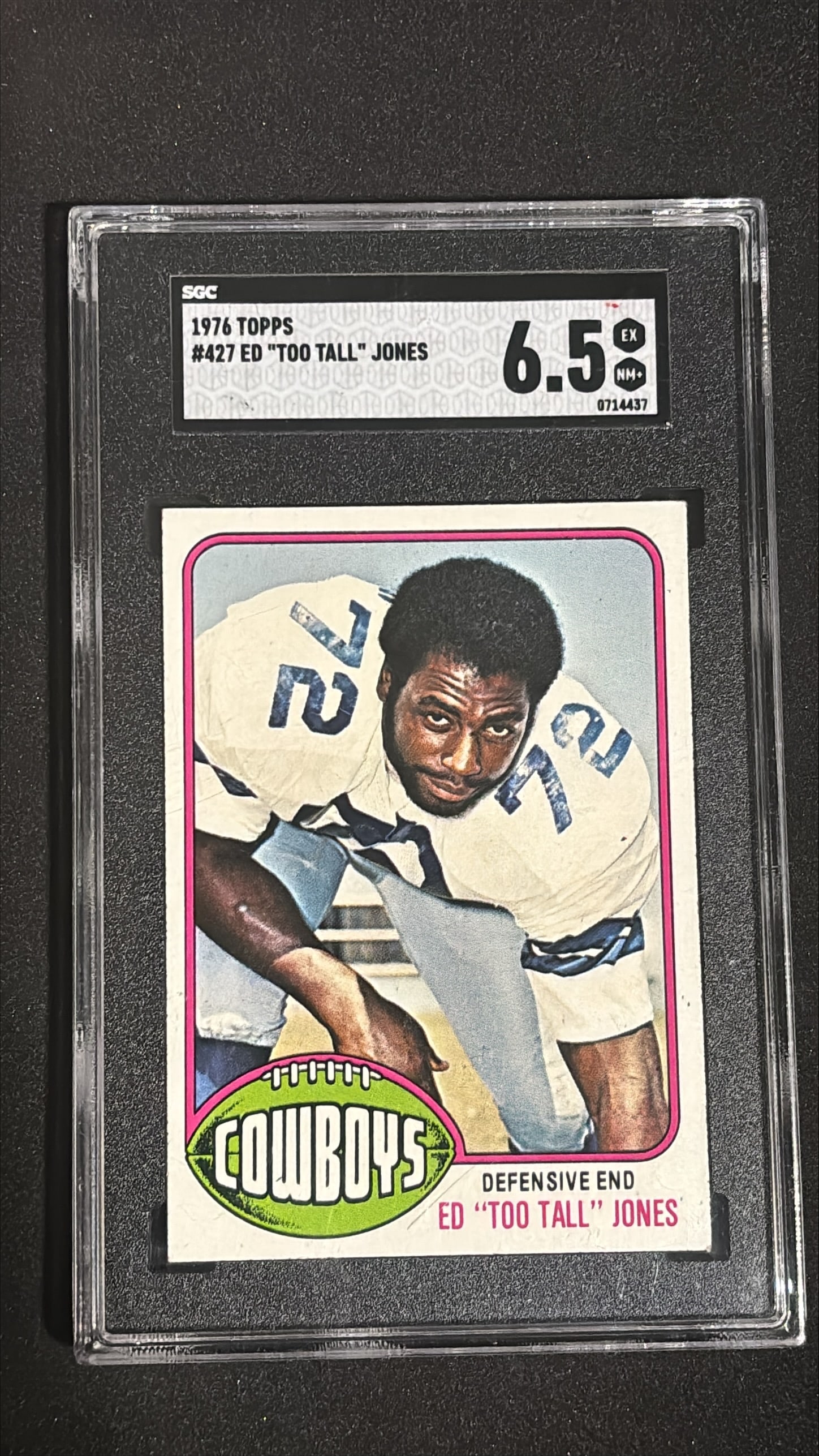 1976 Topps #427 Ed "Too Tall" Jones SGC 6.5 EX-NM+ Rookie - Dallas Cowboys: 1976 Topps #427 Ed "Too Tall" Jones rookie card graded SGC 6.5 EX-NM+. Hall of Famer defensive end, Dallas Cowboys, 5x Pro Bowl selection, key member of Cowboys dynasty.