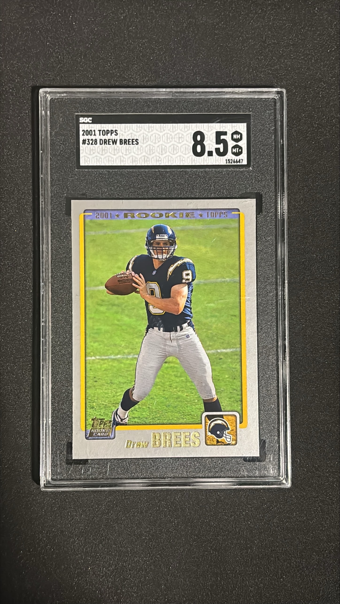 2001 Topps #328 Drew Brees SGC 8.5 NM-MT+ Rookie - San Diego Chargers: 2001 Topps #328 Drew Brees rookie card graded SGC 8.5 NM-MT+. Hall of Fame quarterback, 14x Pro Bowl, 2x NFL MVP, Super Bowl champion, 70,000+ career passing yards.