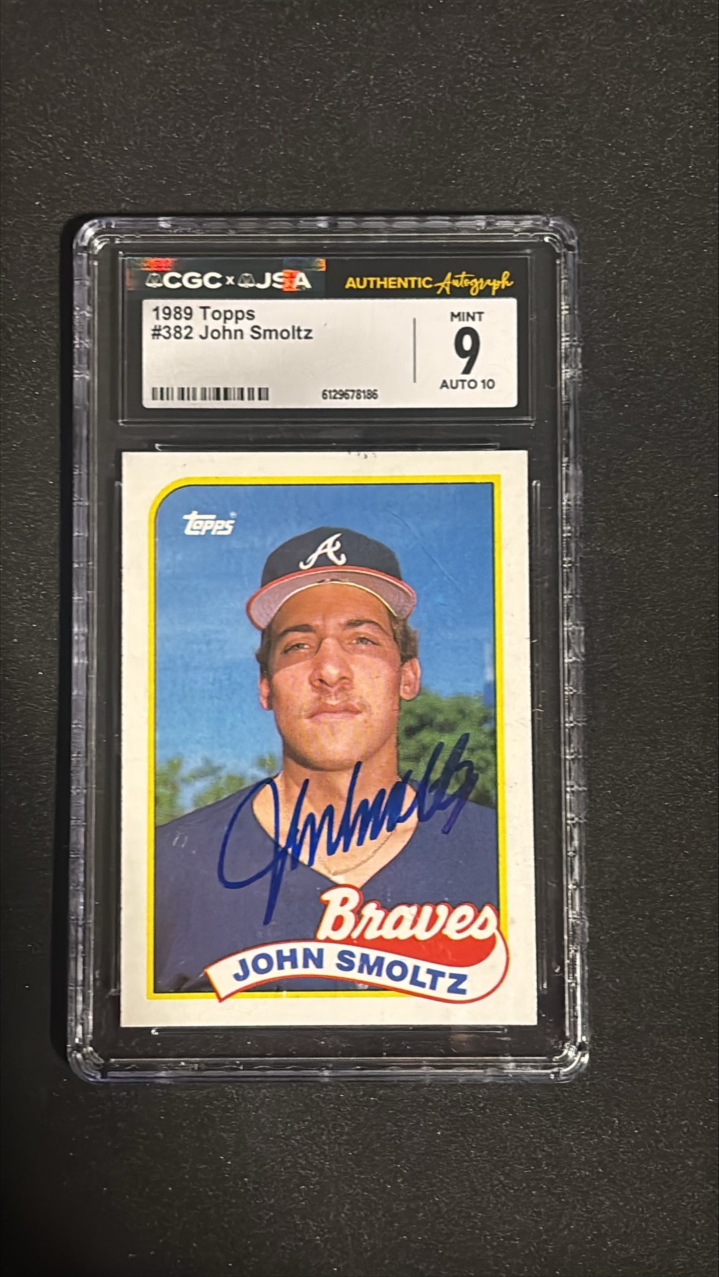 1989 Topps #382 John Smoltz Signed Autograph CGC/JSA Mint 9 AUTO 10 - Braves Rookie: 1989 Topps #382 John Smoltz rookie card signed and authenticated CGC/JSA Mint 9 AUTO 10. Hall of Fame pitcher, 8x All-Star, 1996 World Series MVP, unique pitcher with wins as starter, closer, and reli