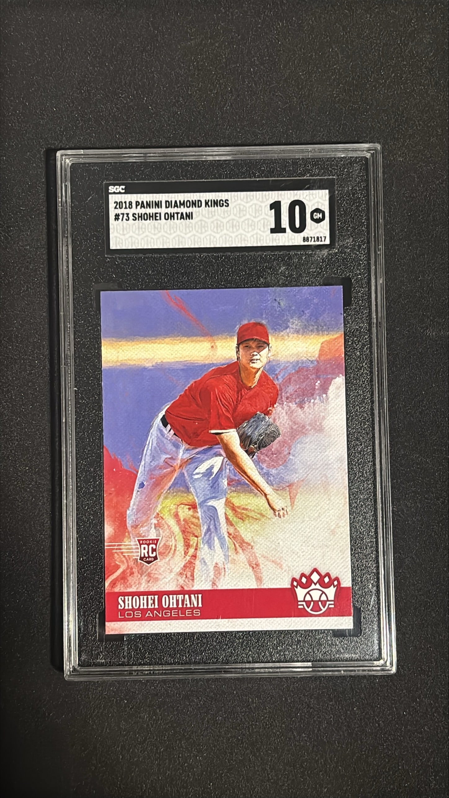 2018 Panini Diamond Kings #73 - Shohei Ohtani SGC 10: Shohei Ohtani 2018 Panini Diamond Kings #73 graded SGC 10 Gem Mint. Historic rookie card of Japanese baseball legend Ohtani. Beautifully designed Diamond Kings card with intricate frame design. Ohtani