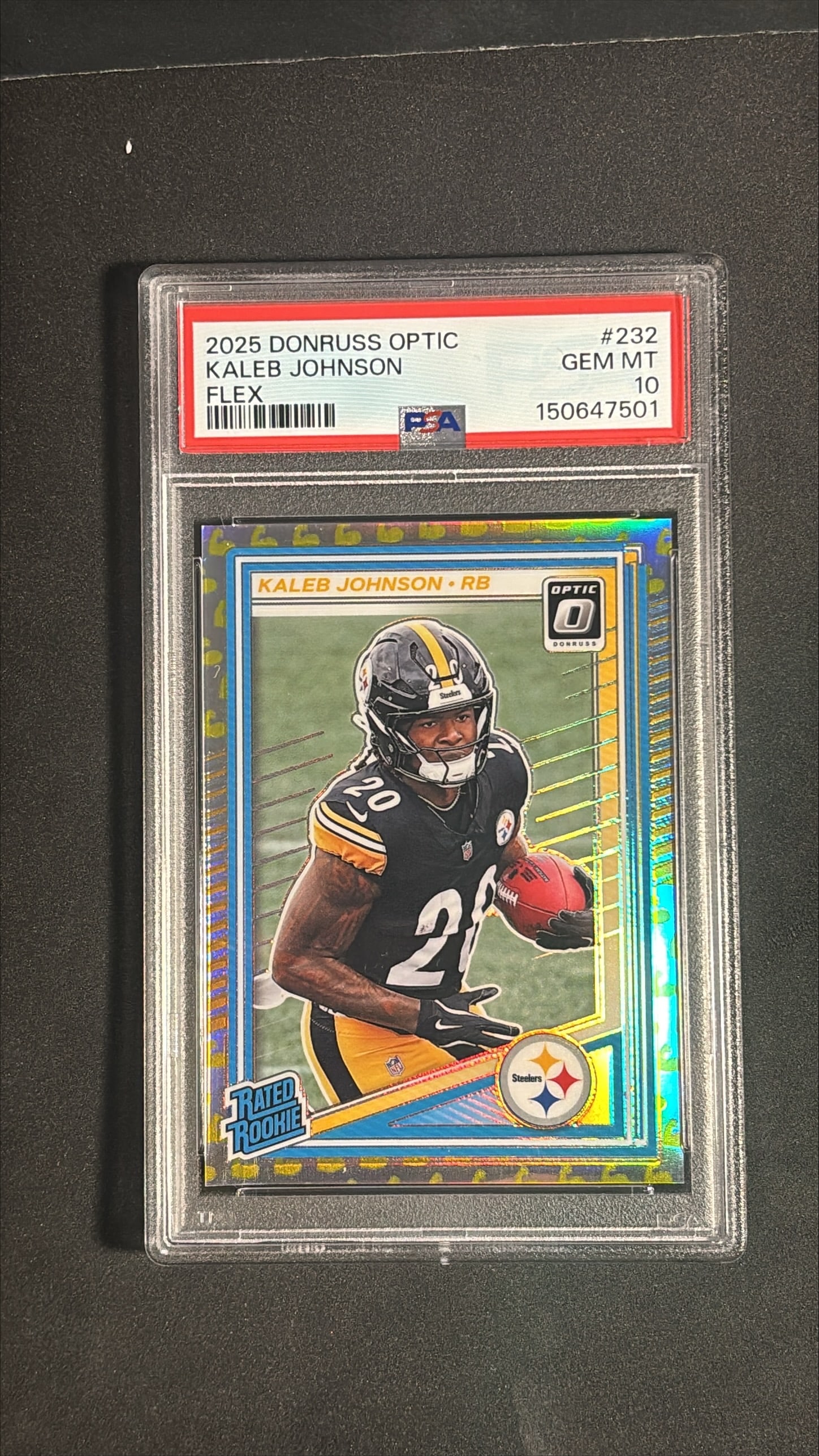 2025 Panini Donruss Optic Kaleb Johnson Flex #232 PSA 10 Rookie /199: 2025 Panini Donruss Optic Kaleb Johnson Flex parallel rookie card number 232, numbered 016 of 199, graded PSA 10 Gem Mint (cert 150647501). The card presents with a bright prismatic finish, pristine s