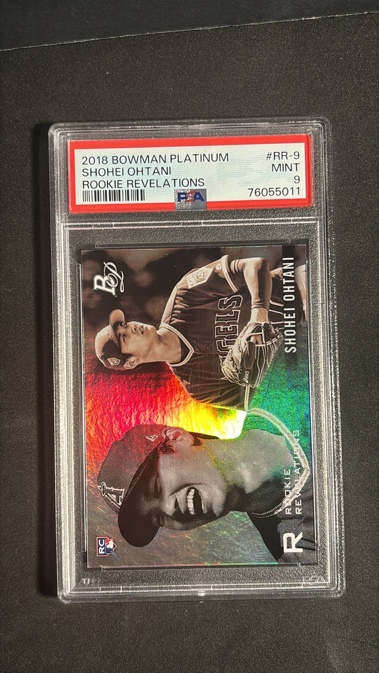 2018 Bowman Platinum Shohei Ohtani Rookie Revelations #RR-9 PSA 9 Rookie: 2018 Bowman Platinum Rookie Revelations Shohei Ohtani rookie card number RR-9, graded PSA 9 Mint (cert 76055011). The card displays a striking refractor design with dual sepia toned images, sharp corn