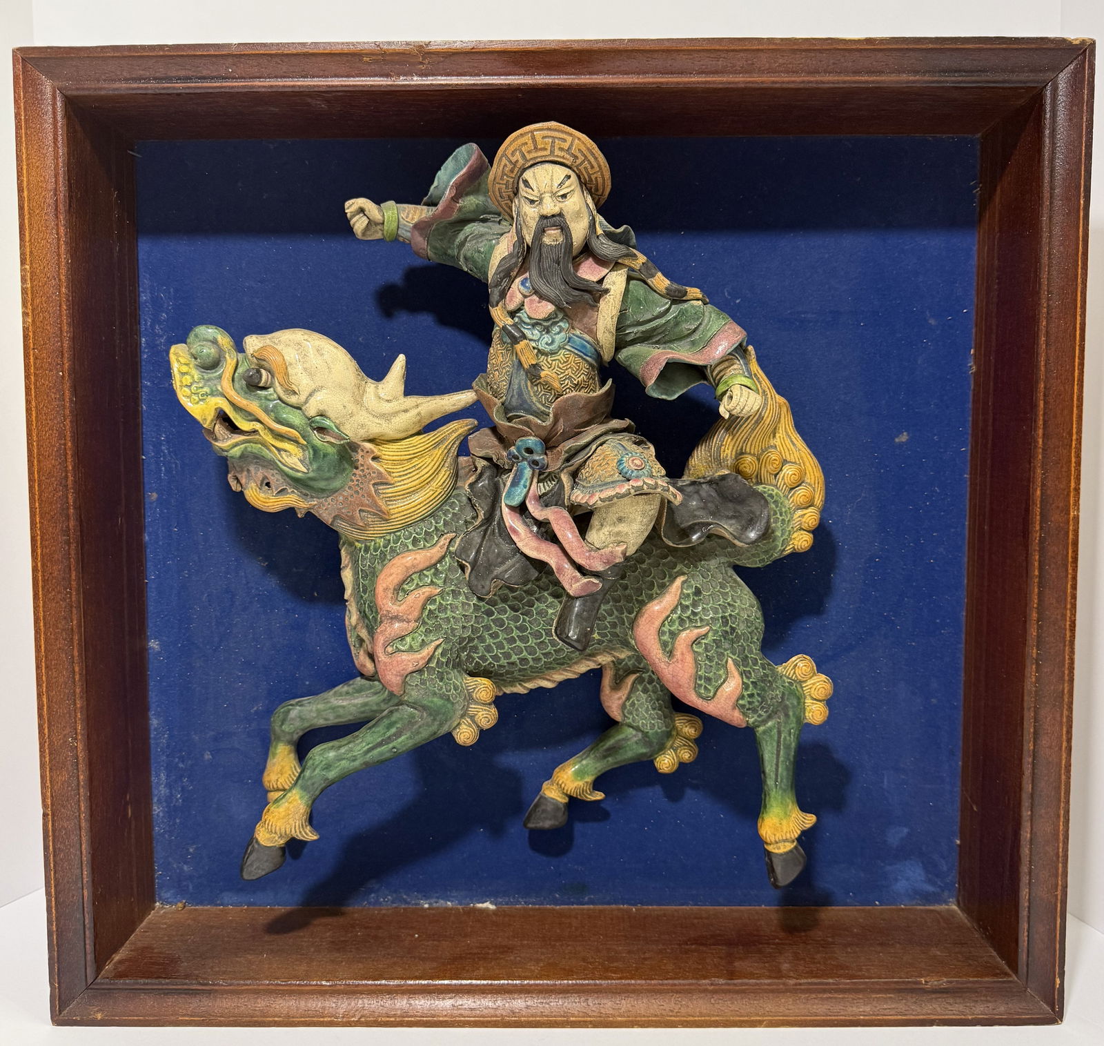 Antique Chinese Qing Dynasty Polychrome Ceramic Temple Tile Relief - Warrior Deity Riding Qilin: An exceptional and highly decorative antique, Chinese polychrome glazed ceramic temple tile relief, depicting a martial guardian deity astride a Qilin - a revered mythological beast symbolizing protec