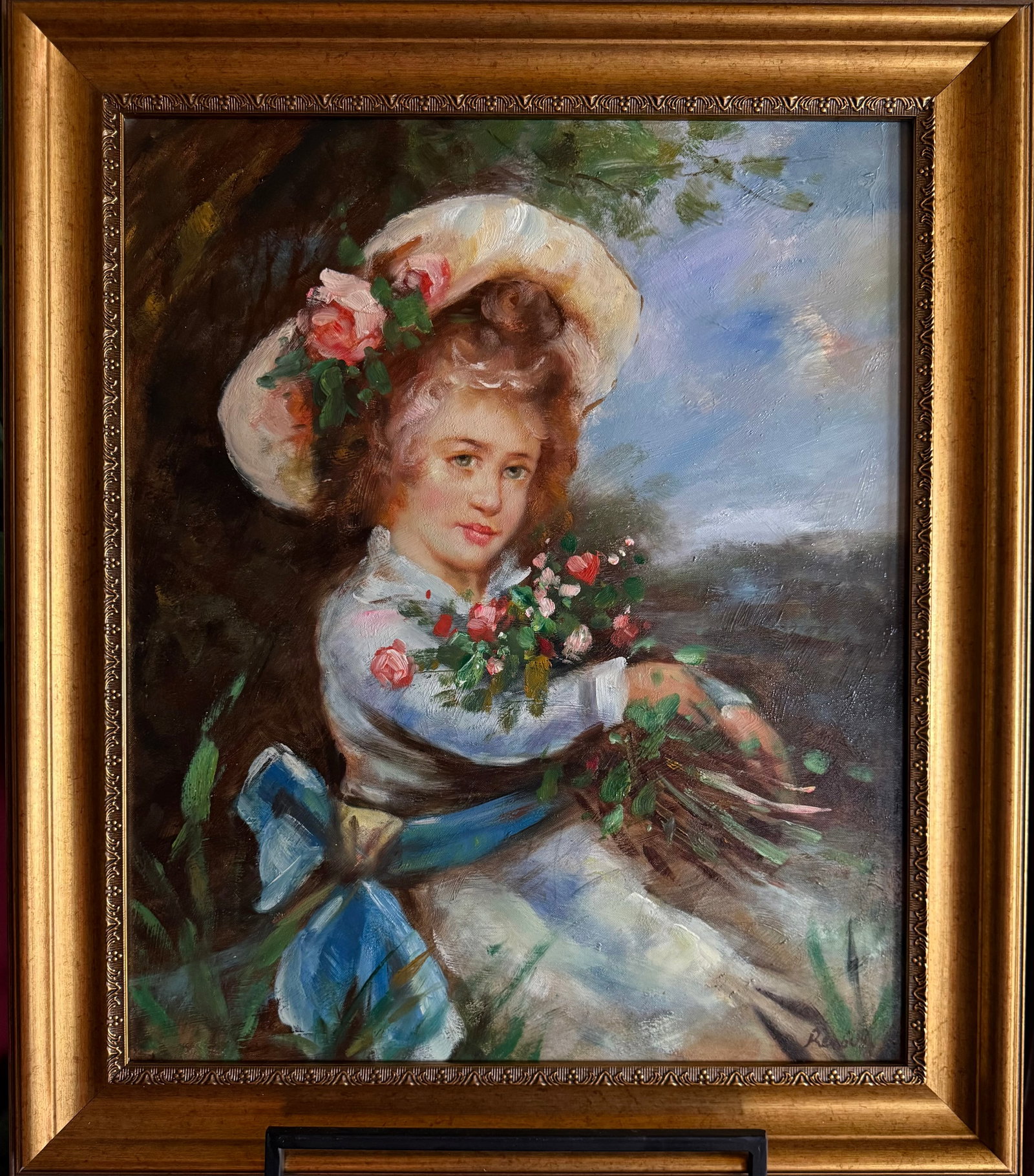 After Pierre-Auguste Renoir, Impressionist Style Portrait of Woman with Flowers, Oil on Canvas: Oil on canvas portrait in the Impressionist style after the works of Pierre-Auguste Renoir depicting a young woman wearing a wide floral hat and holding a bouquet of roses. The figure is shown seated