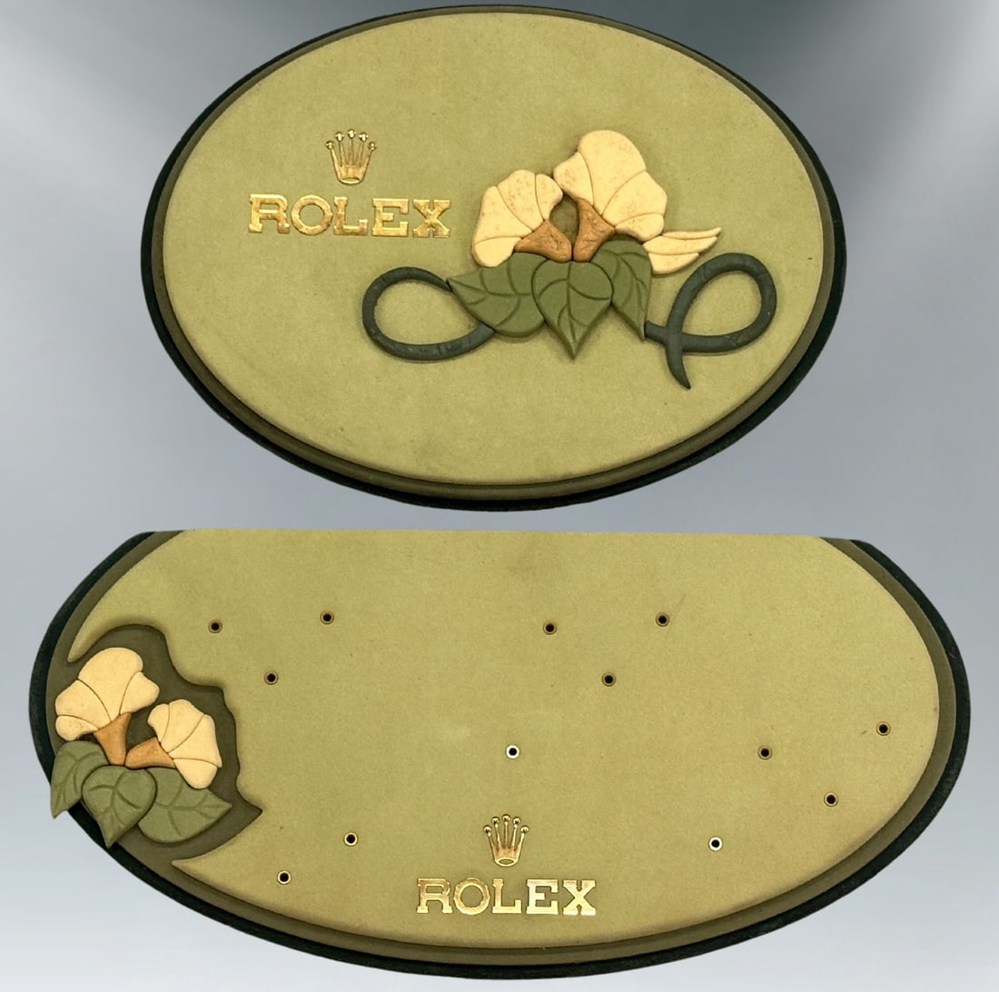Rare Vintage Rolex Authorized Dealer Two-Piece Suede & Floral Watch Display: Authentic and exceptionally rare vintage Rolex point-of-sale display, a true collector's piece. This stunning two-part display is a significant departure from the brand's more common marketing materia