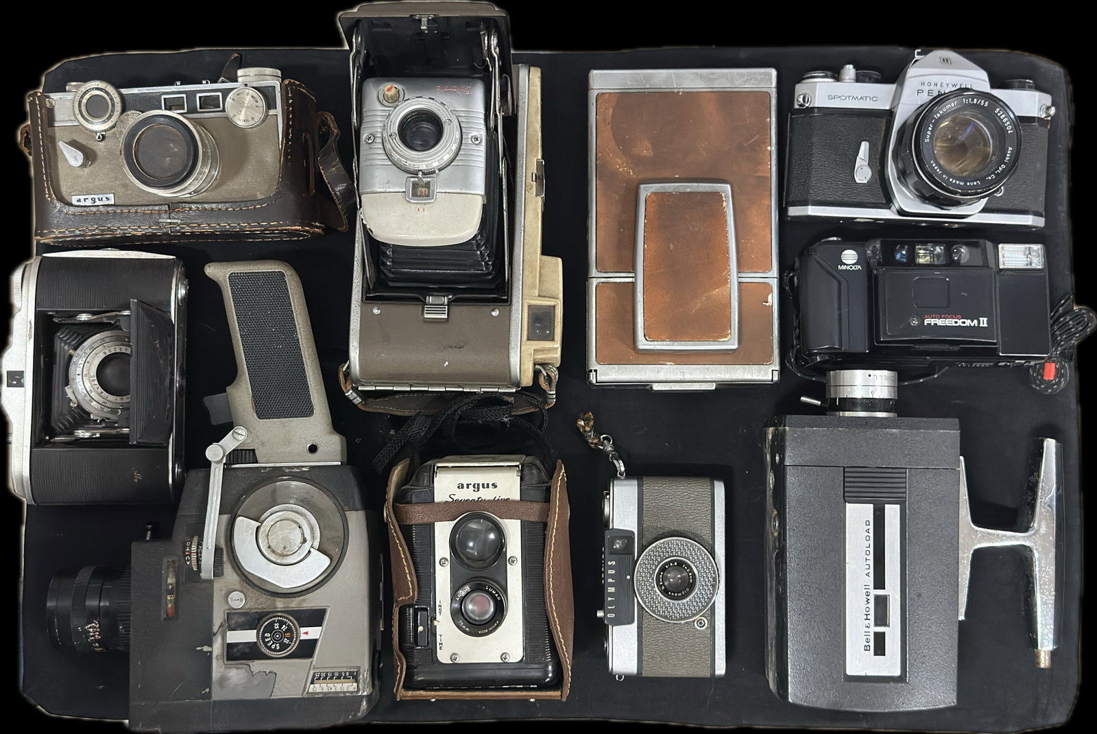 Large Vintage Camera Collection Lot - Polaroid SX-70, Pentax Spotmatic SLR, Argus C3 + More: A fantastic instant collection and journey through the history of 20th-century photography! This lot features ten vintage still and motion picture cameras, including some of the most iconic models eve