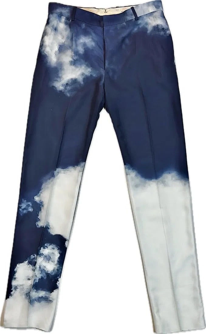 Alexander McQueen Men's Cloud Print Trousers: Item Details Description These striking men's trousers by Alexander McQueen feature a unique cloud print design, showcasing the brand's signature avant-garde style. Crafted in Italy, the trousers are