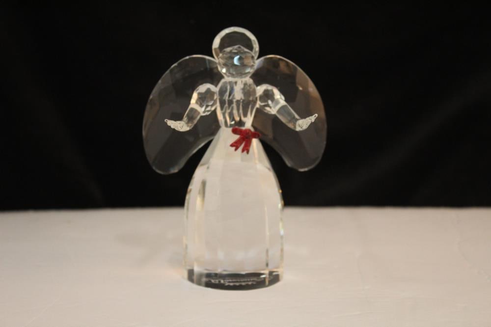 Crystal Angel With Ruby Bow: Crystal Angel with Ruby Bow, handmade and in perfect condition. Size 4x2x5.25 inch"
