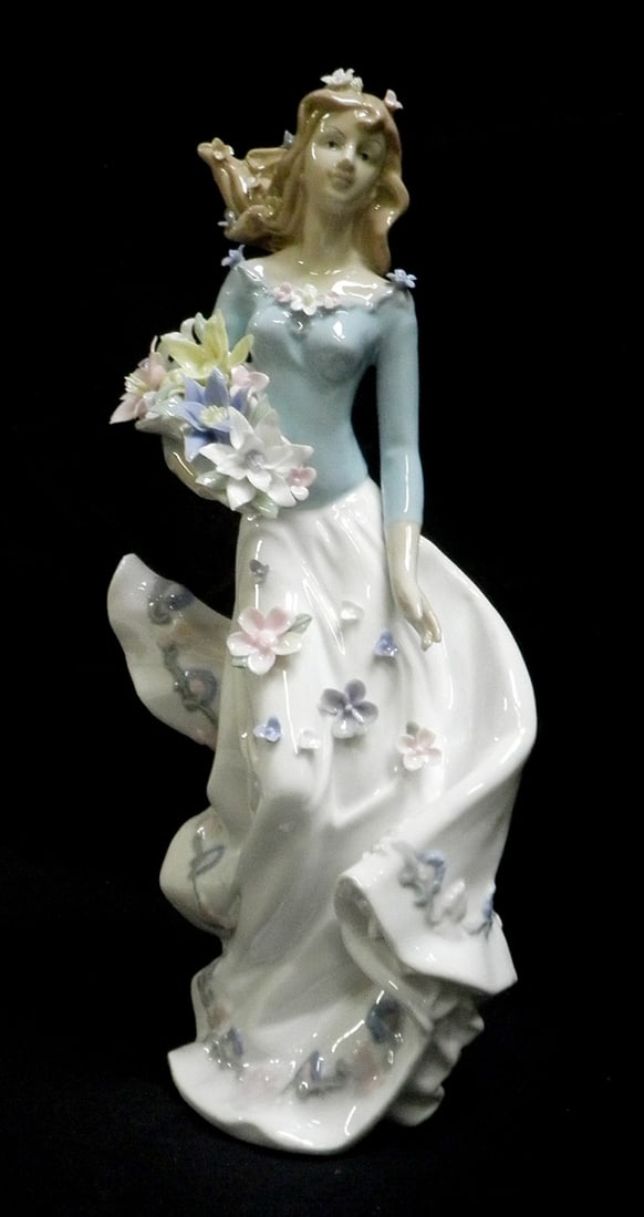 Strolling Through The Meadow Porcelain Figurine: Sorelle "Strolling Through the Meadow" 14" Porcelain Figurine. This item is exquisitely handcrafted of the finest porcelain, and each detail was meticulously painted, with care, by the hands of a