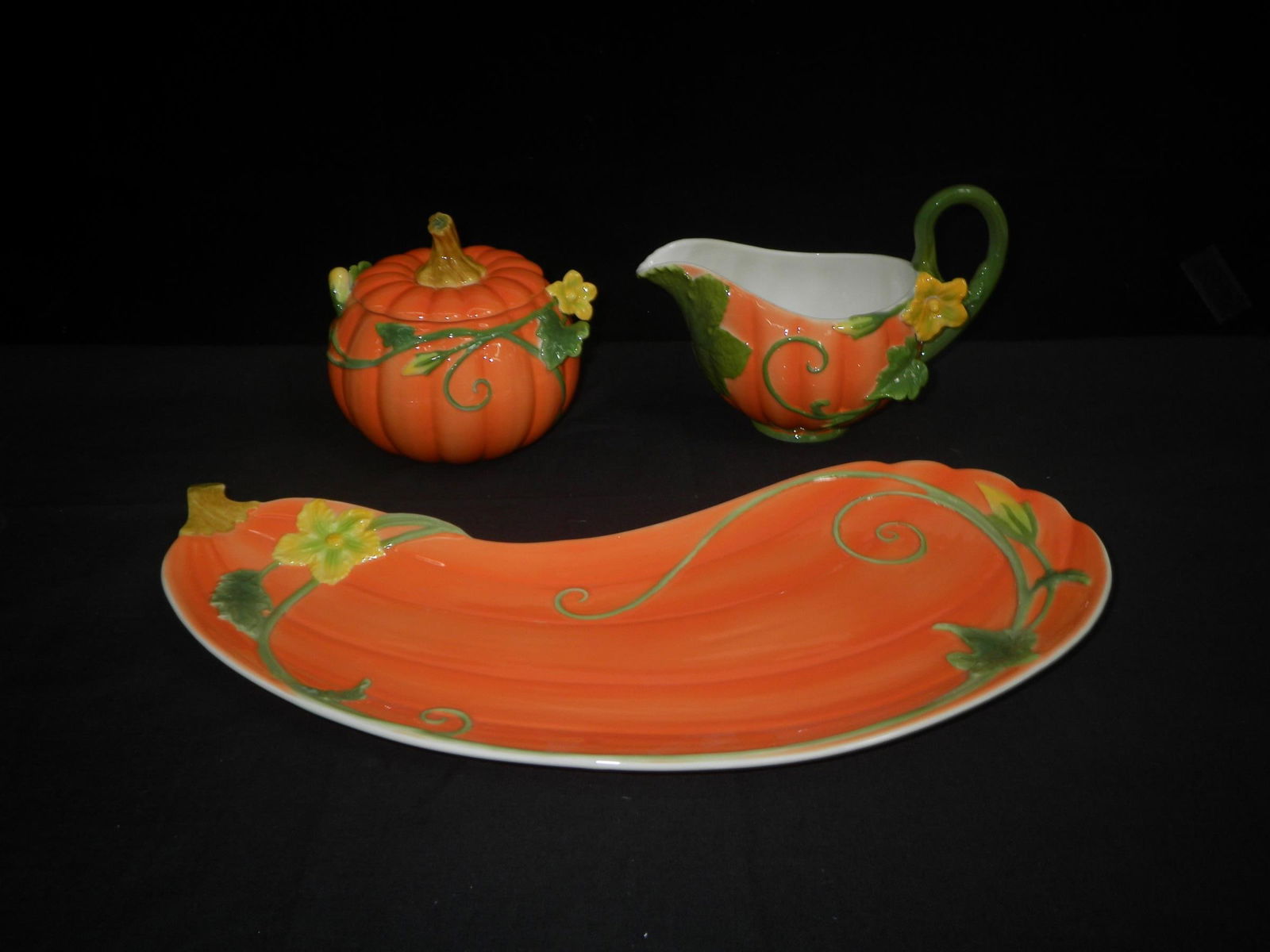 Raised Porcelain Pumpkin Suger Creamer W/Tray: Raised Porcelain Pumpkin Suger Creamer w/Tray. Dimensions: sugar:5x5x4| creamer:4x4x6|tray:13x8x1