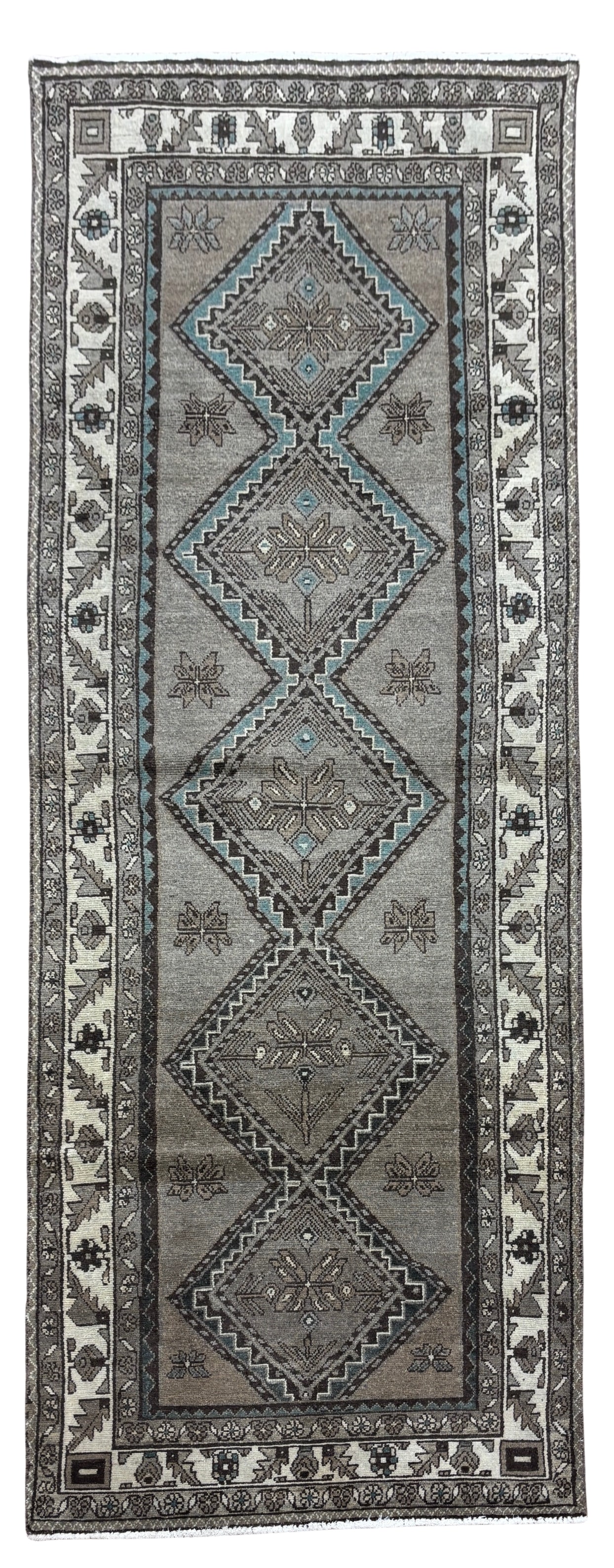 Vintage Hamadan Hand-Knotted Runner 3'5" X 10'1": Hand-knotted runner from the Hamadan region of western Iran, featuring a series of five stepped geometric medallions aligned along the central axis within a muted gray-beige field. The design incorpor