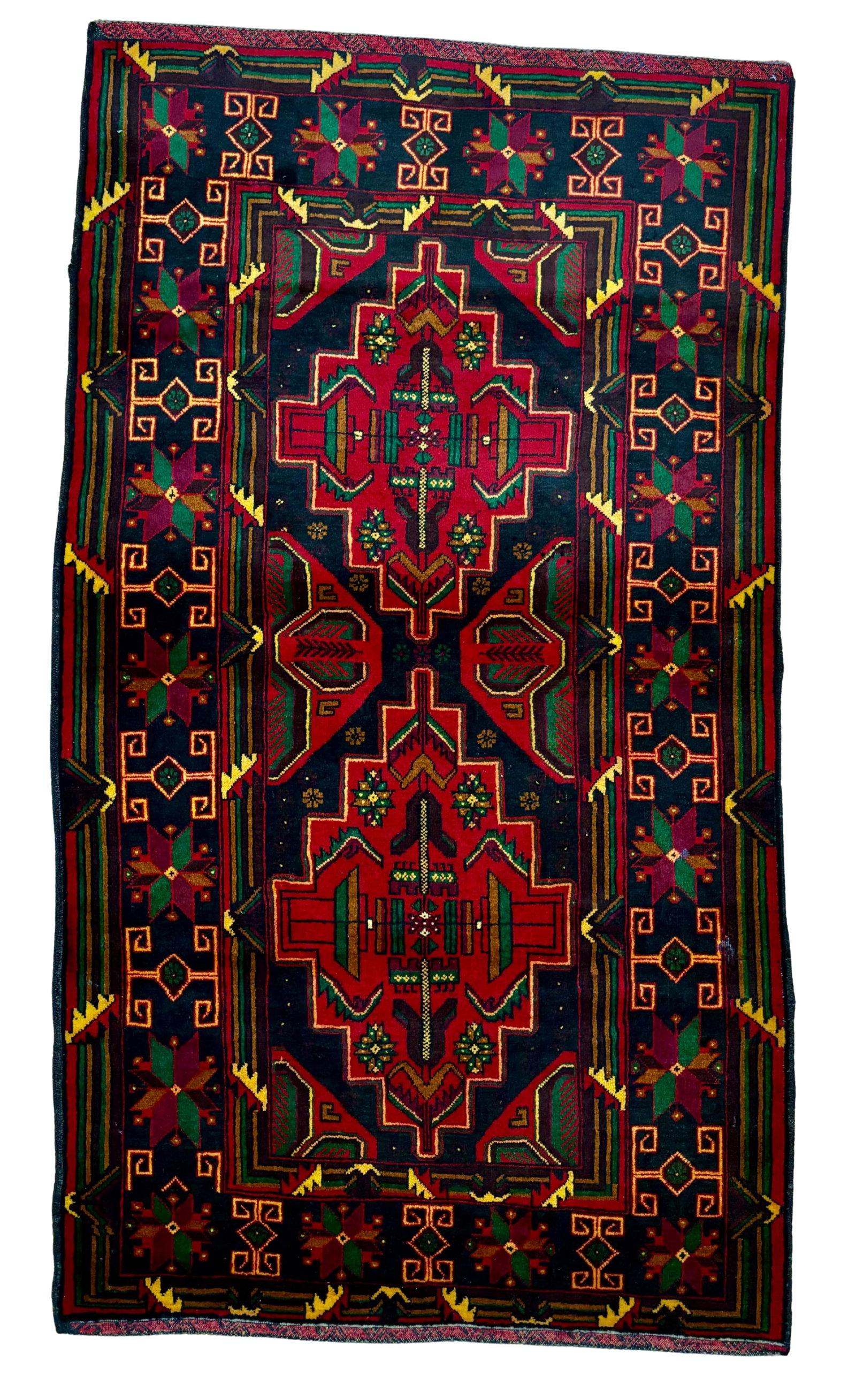 Vintage Beluch Wool Rug 3'7" x 6'5": Hand-knotted Beluch wool rug, measuring 3'7" x 6'5", with large geometric tribal medallions on a deep indigo field with red, green, gold, and ivory accents. Framed by multiple angular borders with sty