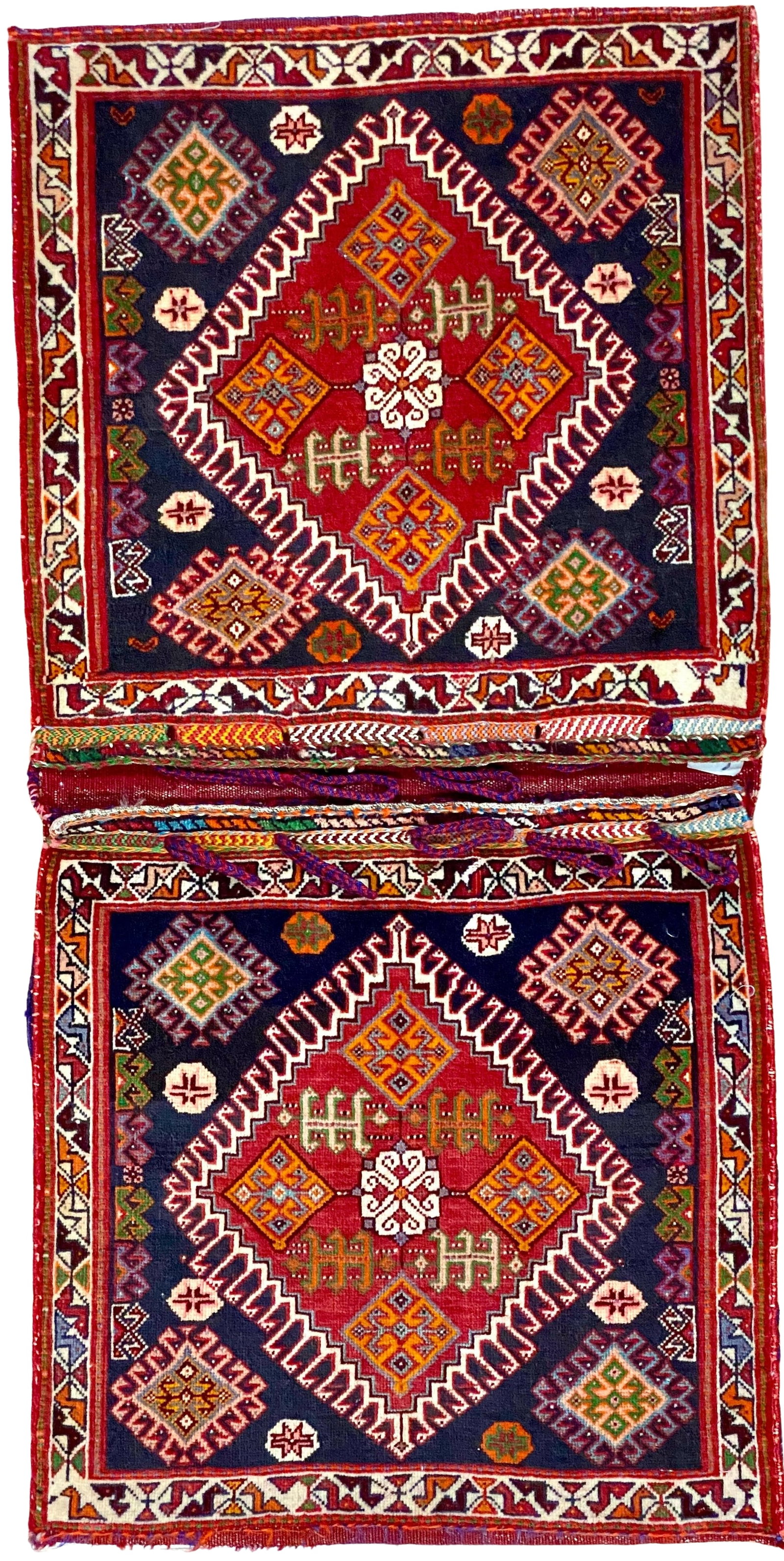 Antique Qashqai Saddle Bag Collectible 2' x 4'3": Antique Persian Qashqai saddle bag (Khorjin) with handwoven geometric tribal motifs in red, navy, ivory, orange, green, and purple tones. Features matching double panels with traditional Qashqai desig