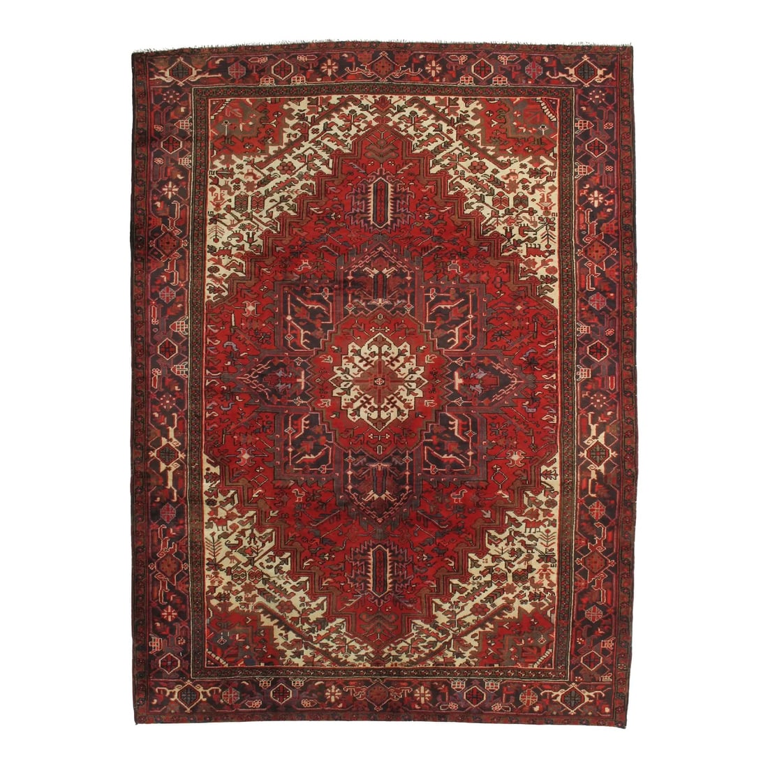 Vintage Persian Heriz Rug 8'0" X 10'10": Vintage hand-knotted Persian Heriz wool rug with a red field centered by a large geometric medallion in navy, ivory, and brown tones, with angular corner spandrels and a multi-band border. Heriz rugs 