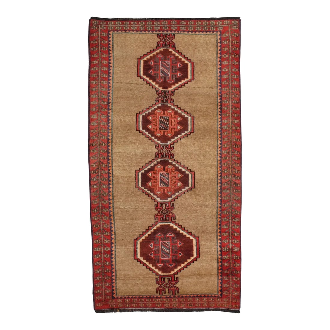 Antique Persian Gabbeh Rug 4'1" X 7'9": Antique Persian Gabbeh hand-knotted wool rug featuring a warm camel-toned field with a vertical row of bold geometric medallions in deep red and brown tones. The design is framed by a decorative borde