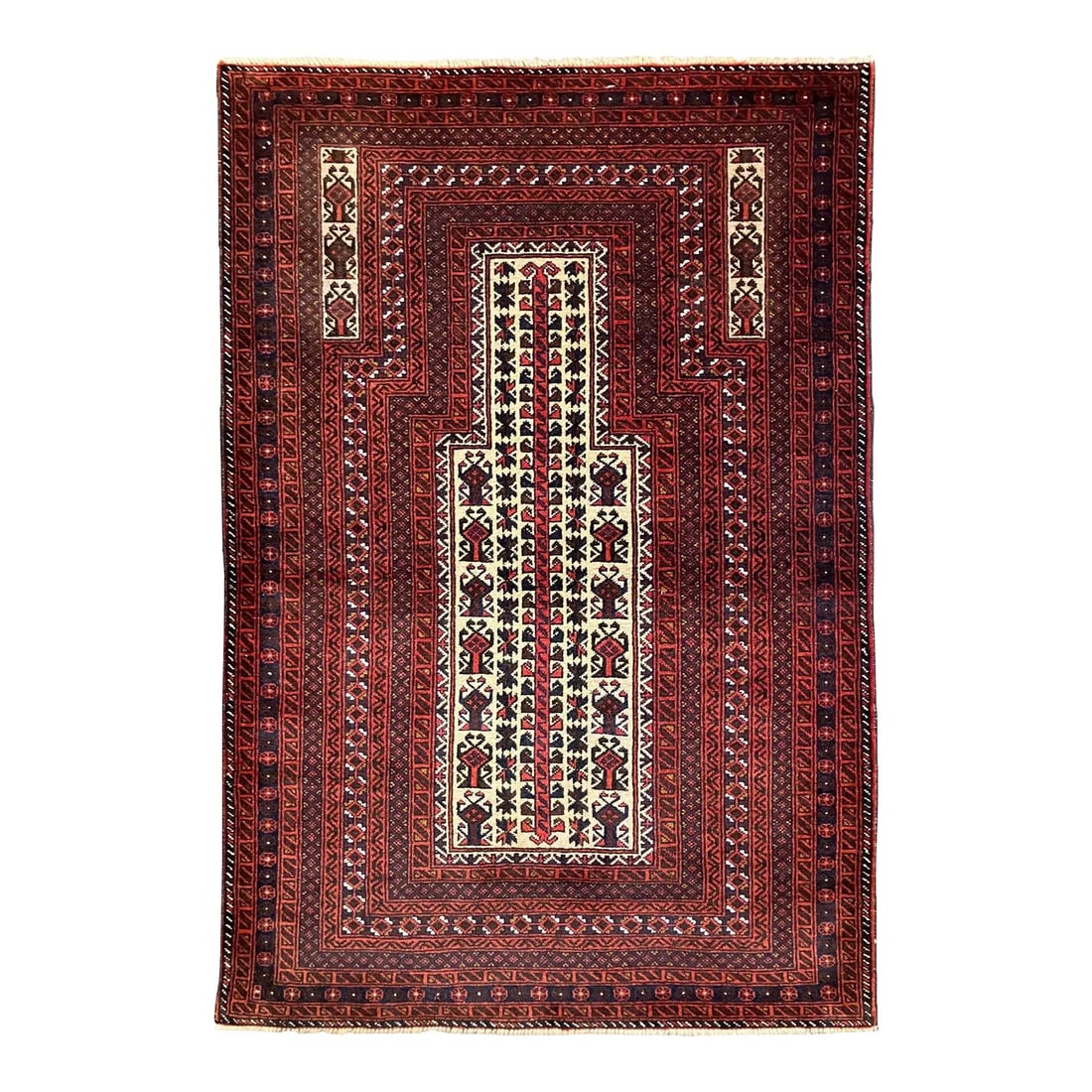 Vintage Baluch Rug 3'0" X 5'0": Hand-knotted Baluch rug, traditionally woven by tribal groups of eastern Iran and Afghanistan. Features an ivory central panel with geometric tree-like motifs, framed by deep red and navy stepped bord