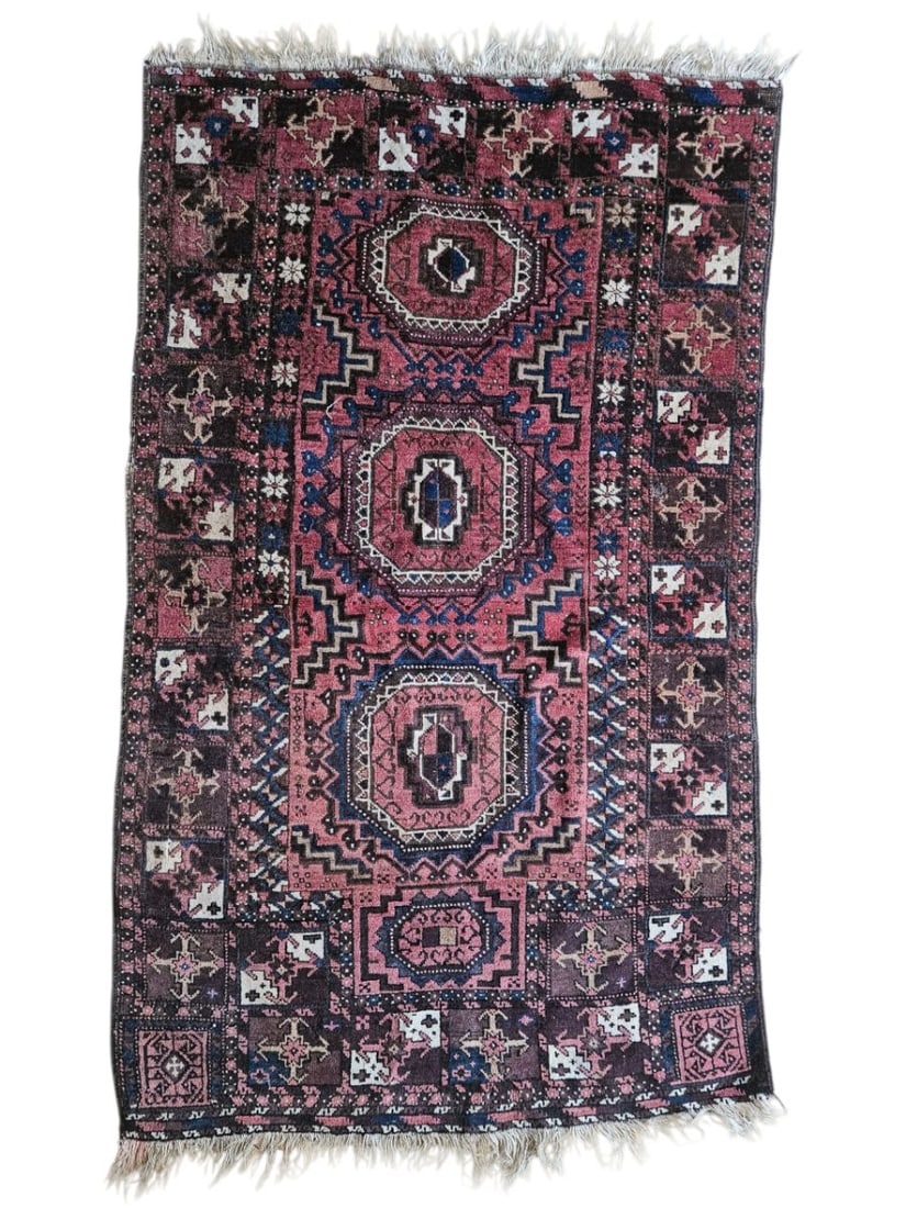 Antique Balouch Afghan Tribal Rug 3'2" x 5'3": Antique Afghan Balouch tribal rug featuring geometric medallions, angular motifs, and multiple decorative borders. Woven in deep burgundy, charcoal, rust, muted blue, and ivory tones, with fringed end