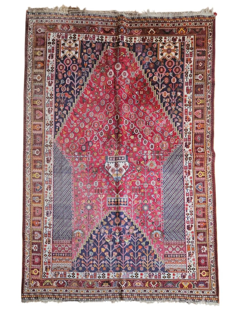 Vintage Persian Tabriz Rug 5'3" x 8'3": Vintage Persian Tabriz rug featuring a central geometric medallion surrounded by floral and ornamental motifs and multiple patterned borders. Woven in red, ivory, blue, rust, and brown tones, with sty