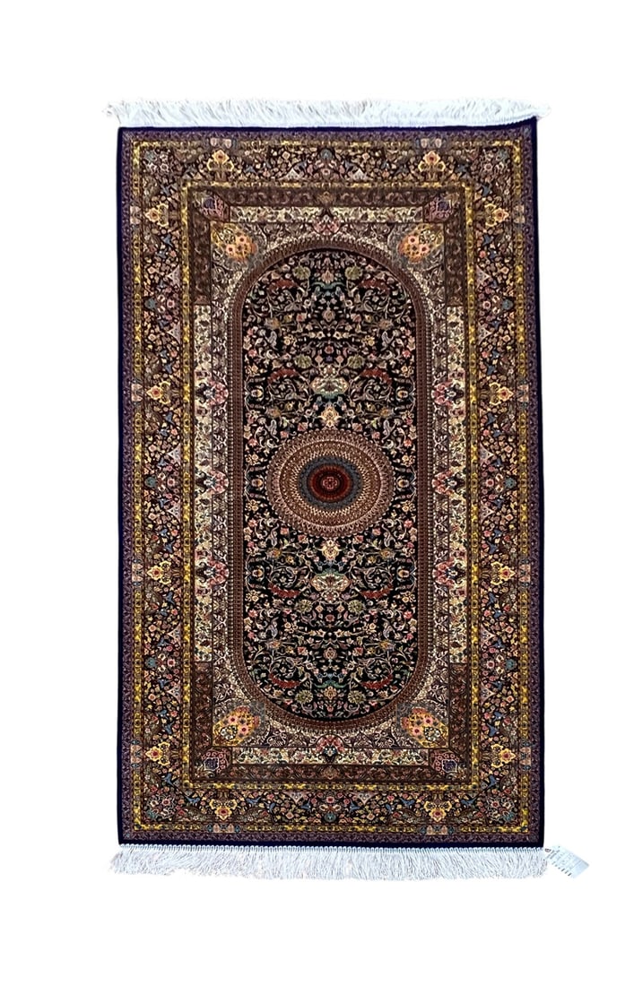 Persian Qum Silk Machine Made Rug 3'2" x 6'6": Persian Qum silk rug, machine made in Iran. Measuring 3'2" x 6'6", the rug features an elegant traditional Persian design with a large oval central medallion surrounded by intricate floral motifs. The
