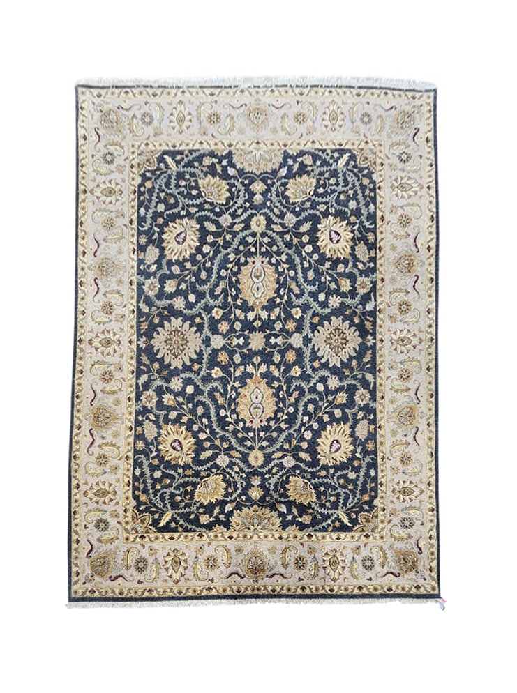 Indo Persian Tabriz Rug Wool & Silk 9' x 12': Indo Persian Tabriz rug, hand knotted in India from 100% wool with silk highlights. Measuring 9' x 12', the rug features an elegant all-over floral design with scrolling vines, palmettes, and traditio