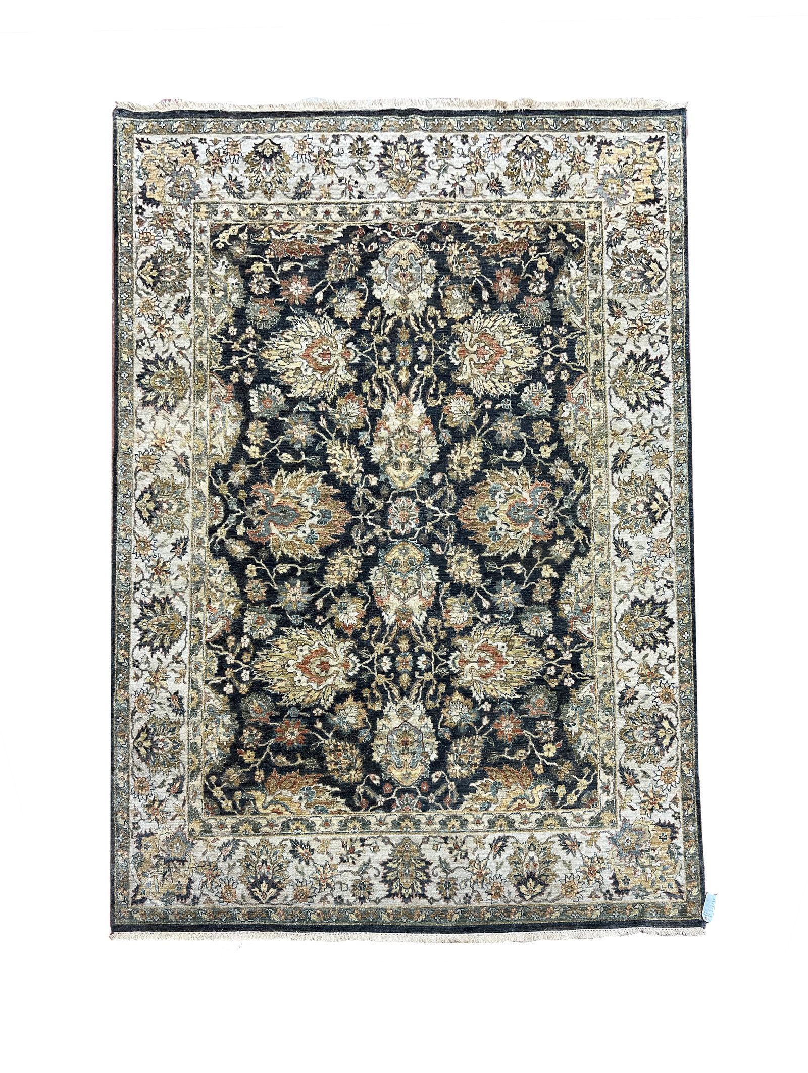 Indo Agrah Hand Knotted Wool Rug 7'9" x 10'1": Indo Agrah rug, hand knotted in India from 100% wool. Measuring 7'9" x 10'1", the rug features a rich dark navy field decorated with an intricate allover floral and botanical design. The pattern incor
