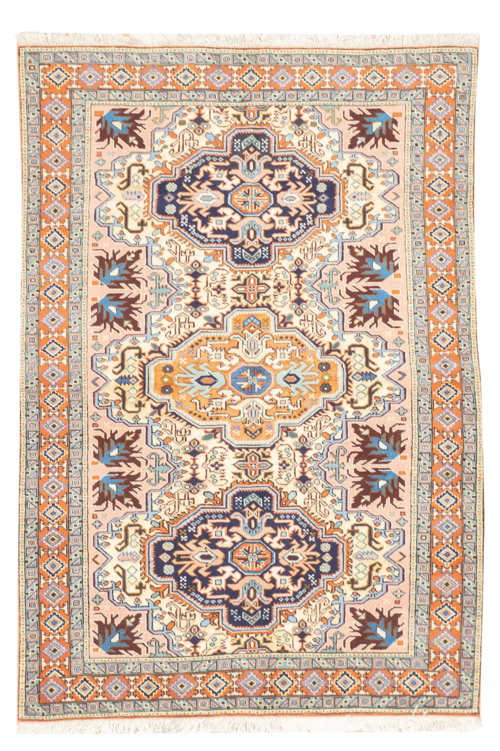 Vintage Persian Ardebil Rug 4'4" x 6'4": Fine vintage hand-knotted Persian Ardebil rug with a symmetrical geometric medallion design set within an ivory field. Stylized tribal motifs and angular medallions are arranged across the field, encl