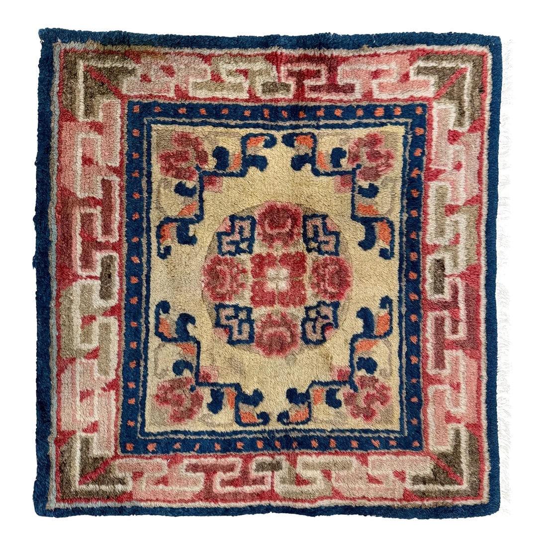 Mid-20th Century Chinese Art Deco Rug 2'0" X 2'2": Hand-knotted wool rug measuring 2'0" x 2'2" (24" x 26"), featuring a central floral medallion with stylized botanical and geometric motifs on an ivory field. The border includes a repeating geometric 