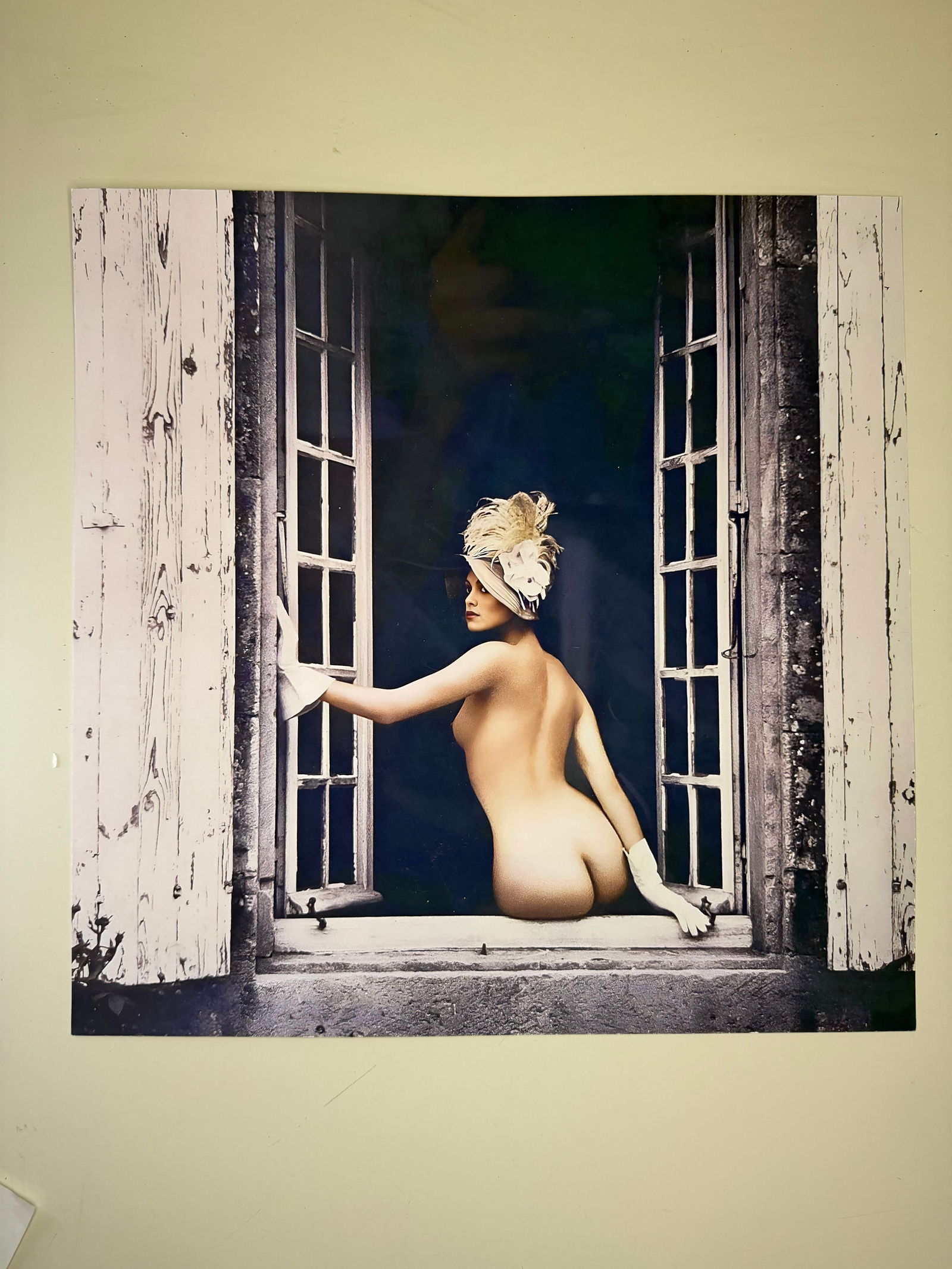 Patrick Lichfield (British, 1939–2005) Female Nude at Window, 1991 (printed 2008): Color photographic print by Patrick Lichfield, depicting a female nude figure posed at an open window in a refined, theatrical composition.Photograph taken in 1991, printed in 2008.Printed on baryta p