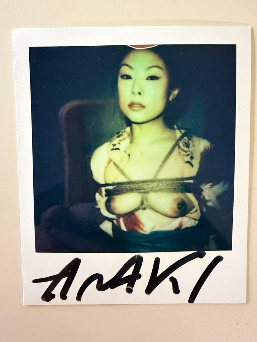 Nobuyoshi Araki (Japanese, b. 1940) Untitled (Polaroid), c. 1990s: Original Polaroid photograph by Nobuyoshi Araki, depicting a female subject bound in kinbaku style, a central and recurring theme in the artist’s oeuvre.The image is characterized by Araki’s disti