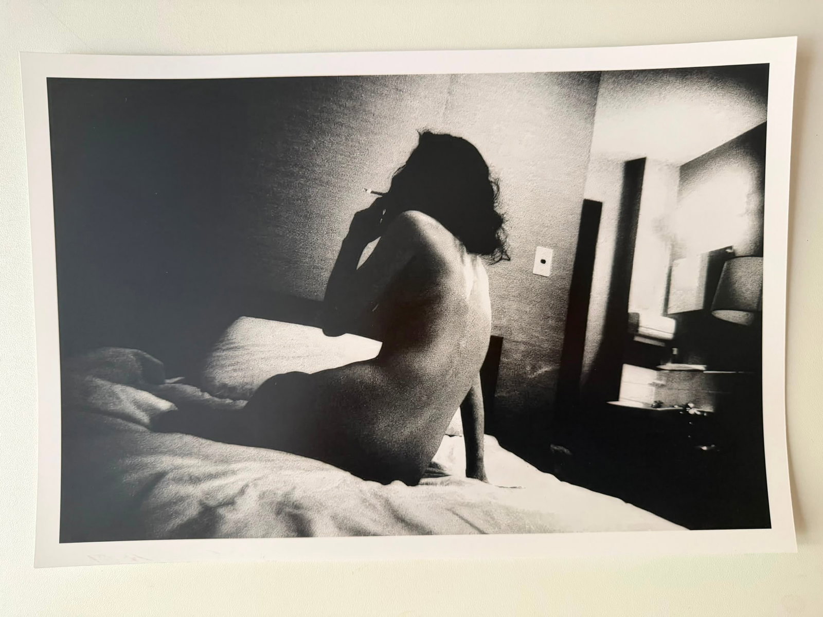 Daido Moriyama – Hotel Room Silhouette & Smoke (Tokyo / Osaka Series) | Original Fine Art Print: Daido Moriyama (born 1938)Title: Nocturnal Hotel Vignette / Nude with CigaretteMedium: Fine Art Silver Halide Photographic Print on Archival PaperDimensions: Approx. 21 x 33 cm (Horizontal format)Sign
