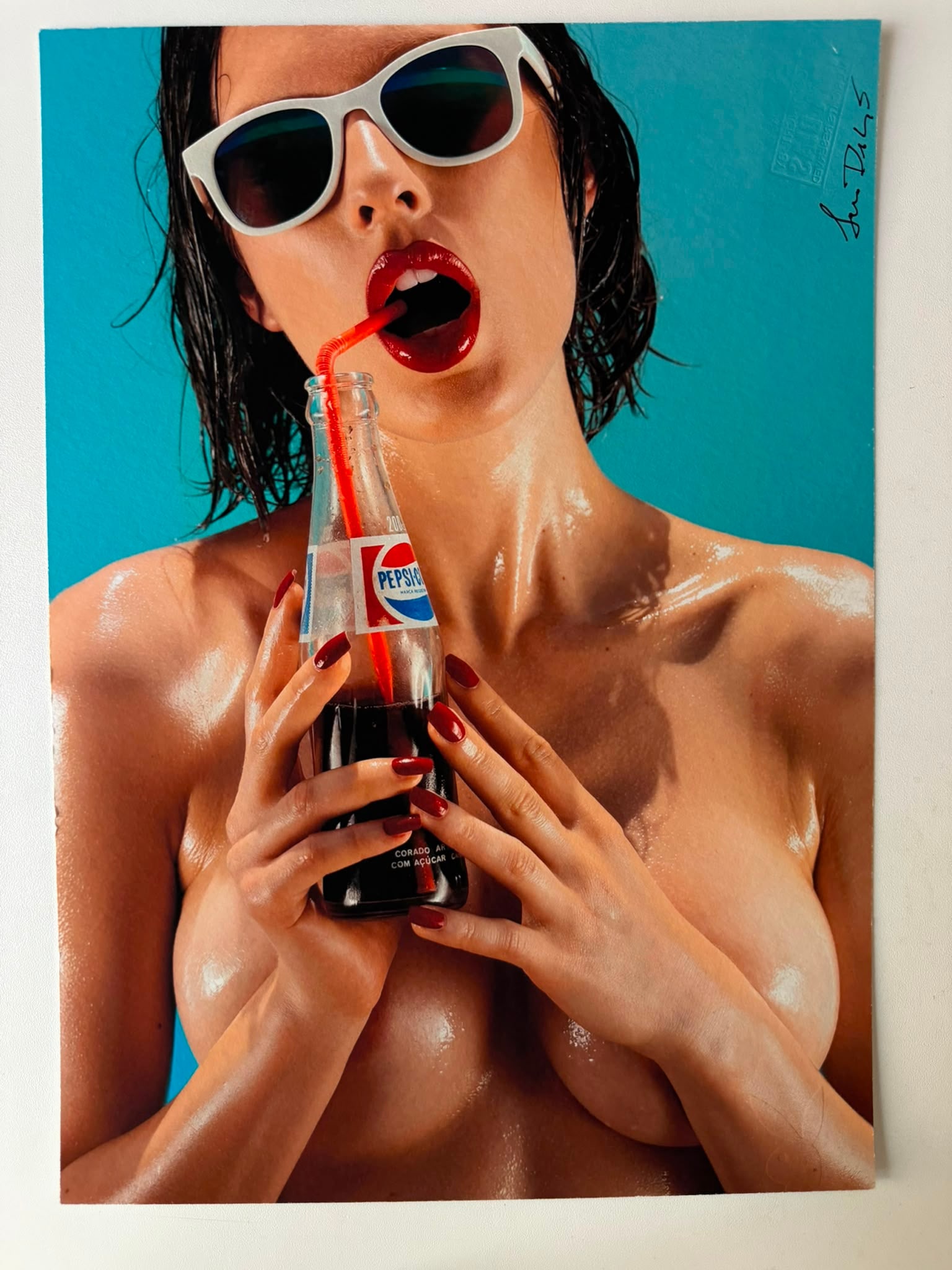 Ana Dias – Pepsi | Signed Photograph for Playboy - 34x24 cm: An original colour photograph by internationally recognised Portuguese photographer Ana Dias, celebrated for her vibrant editorial and glamour photography.The image presents one of Dias' signature vis
