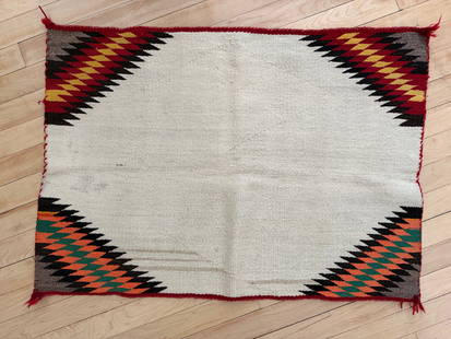 Historical Navajo Weaving / Blanket, Single Saddle Blanket, Circa 1930s: Germantown colors: Yellow, green, red and orange. Natural wool color: brown, black and tan variation. Provenance: purchased in 2014 from the Nizhoni Ranch Gallery in Sonoita, Arizona for the