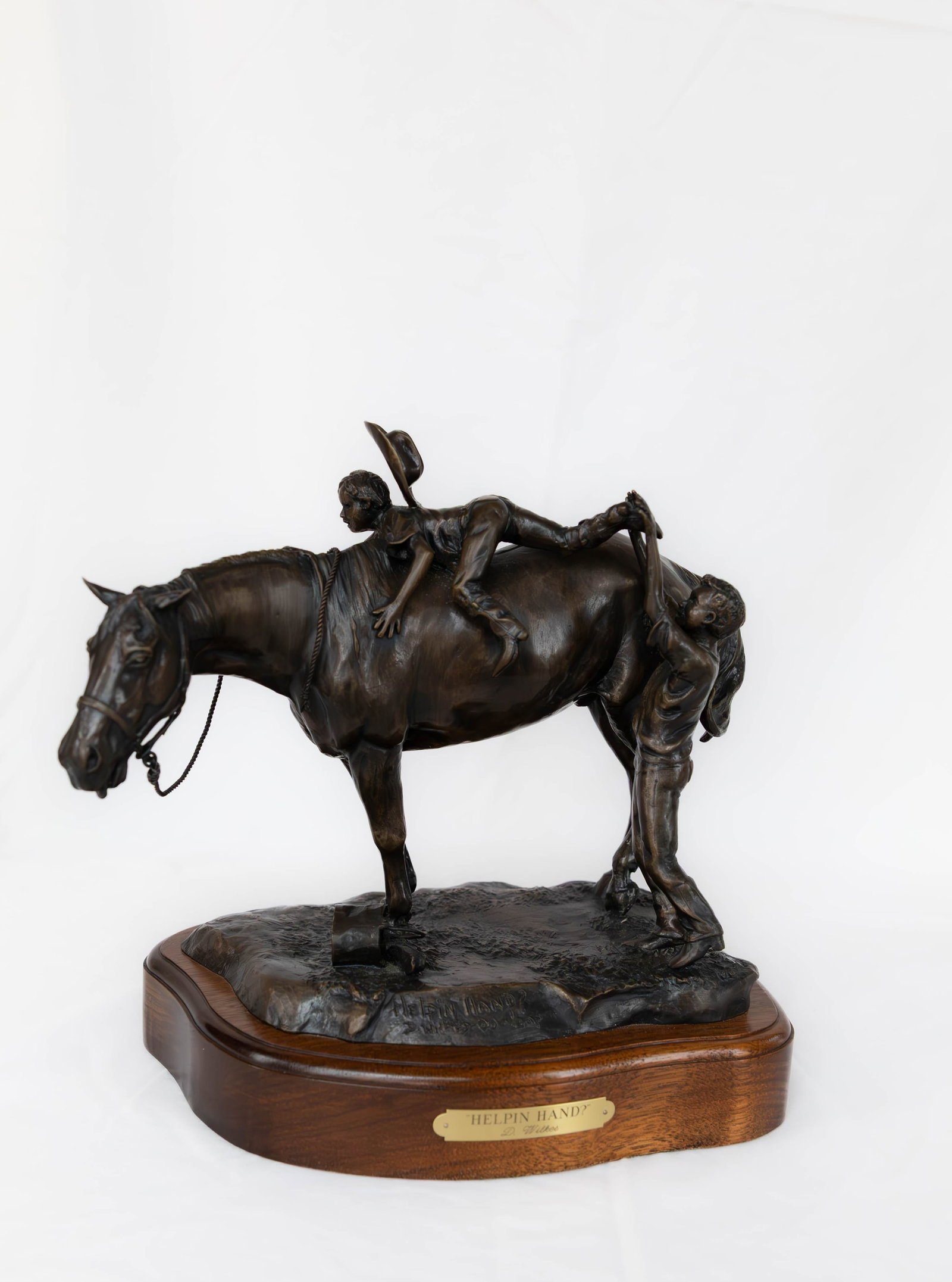 D. Wilkes, Helpin' Hand?, Bronze: D. Wilkes, Helpin' Hand?, Bronze. Wooden Base, Edition 1/2 AP. Size 12" x 6" x 10".