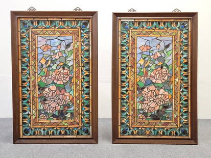 PAIR VINTAGE STAINED & LEADED GLASS WINDOW PANELS: Pair of vintage stained and leaded glass window panels, both in wooden frames measuring a total of 35.75" tall x 23" wide and 7/8" thick. Condition: good, no apparent cracked panels, no losses or repa