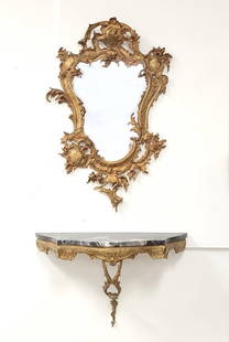 ROCOCO STYLE GILT BRONZE MIRROR & WALL MOUNT TABLE: Vintage Rococo Louis XV style gilt bronze mirror and wall mount console table with a cut black marble top. The mirror measures a total of 32.25" tall x 21" wide, and the table measures 26" wide x 16"