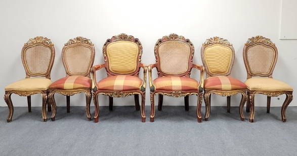 SIX VENETIAN POLYCHROME CARVED WOOD DINING CHAIRS: Six Venetian Italian Rococo style polychrome carved wood dining chairs with upholstered seats. Four of the chairs have a plaid silk fabric upholstery seat and two have a gold tone woven texture fabric