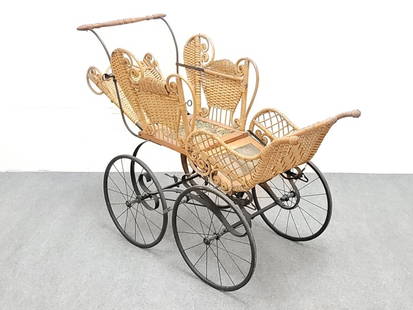 ANTIQUE VICTORIAN WICKER BABY CARRIAGE PRAM: Antique Victorian wicker baby carriage / pram stroller. Measures 36.5" tall to the handle, x 23" wide axle end to end, and a total of 47.5" long. Condition: no cushions or pillows included, good condi