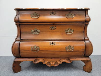 ANTIQUE DUTCH BAROQUE REVIVAL CHEST OF DRAWERS: Antique Dutch Baroque Revival pine chest of drawers measuring 31.5" tall x 39.5" wide and 22" deep. Condition: pulls have been replaced but locks appears to be original. no key, small scattered early