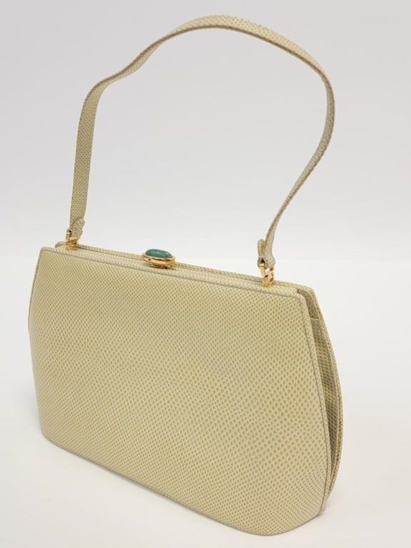 JUDITH LEIBER PALE CELADON KARUNG LEATHER PURSE: JUDITH LEIBER PALE CELADON KARUNG LEATHER PURSE: top handle snakeskin purse with gold tone hardware and gold tone push clasp with oblong jade cabochon. Cream grosgrain fabric interior with two pockets