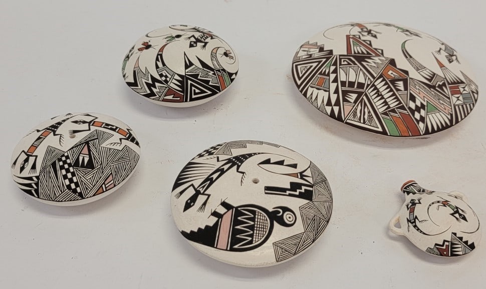 FIVE CAROLYN CONCHO ACOMA POTTERY VESSELS: Lot of five Acoma, NM pottery vessels by Carolyn Concho. Includes four seed pots and one miniature canteen. The largest seed pot measures 5.25" diameter. All signed on base. Condition: good, no signs 