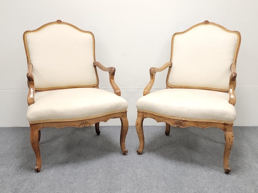 PAIR ANTIQUE 18TH CENTURY QUEEN ANNE ARMCHAIRS: Pair of antique late 18th century Queen Anne armchairs with off-white canvas upholstery. Each one measures 41.25" tall x 27.5" wide and approx. 32" deep. Condition: minor scattered wormage to frame, m