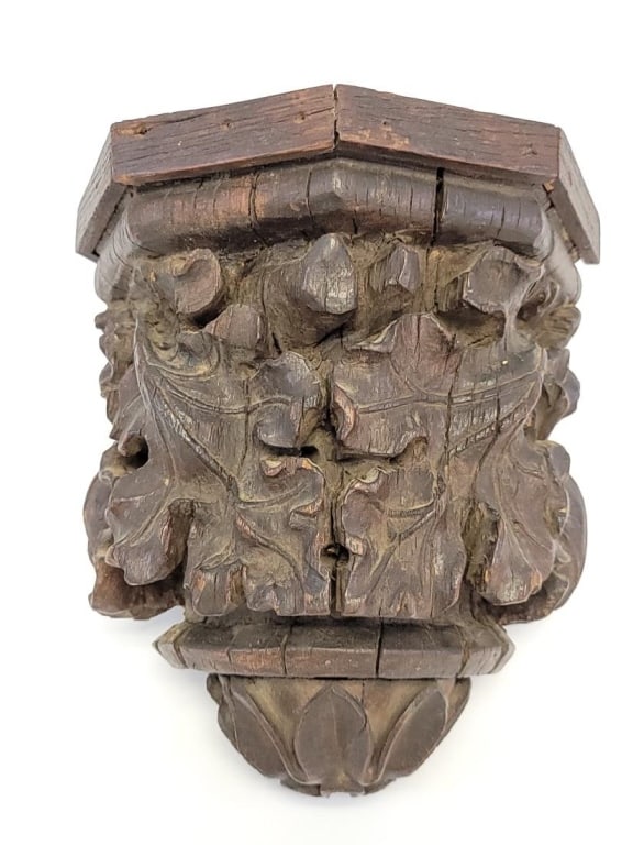 GOTHIC PERIOD CARVED WALNUT CORBEL, WALL BRACKET: Antique original Gothic period carved walnut corbel or wall bracket, architectural remnant circa 15-16th century. Measures a total of about 9.5" tall x 8.75" wide and 6" deep. Early wrought iron brack