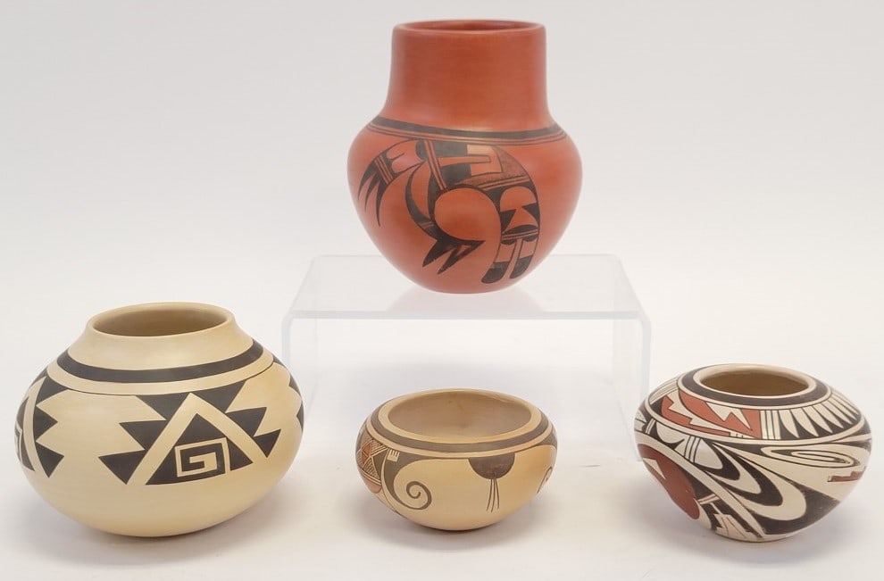FOUR HOPI NATIVE AMERICAN PUEBLO JARS: Lot of four Hopi Native American pueblo pottery jars. Includes Madeline Sahneyah, Maynard & Veronica Navasie, Sadie Adams, and Darlene Nampeyo. All pieces are signed on base.Tallest is the Sadie Adams