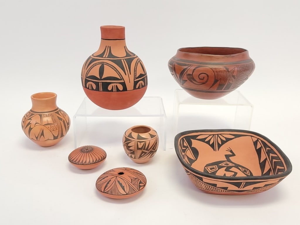 SEVEN PUEBLO REDWARE POTTERY POTS AND BOWLS: Lot of seven Pueblo redware pottery pots and bowls. Includes two unsigned pieces, an illegibly signed bottle vase, (2) pieces by Marie Sandoval San Felipe, and (2) Mark Wayne Garcia Santo Domingo seed