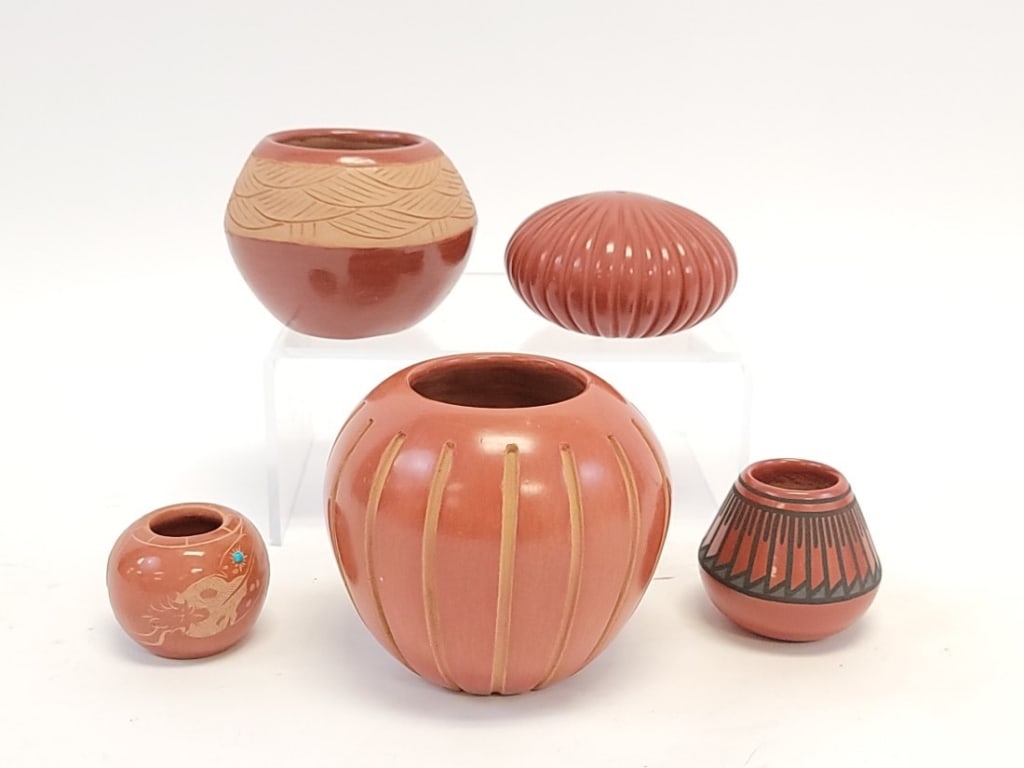 FIVE SANTA CLARA PUEBLO REDWARE POTTERY POTS: Lot of five Santa Clara Pueblo redware pottery pots. Includes Annette Vigil, Phyllis Hemlock, Tomasita Montoya, Anna Archuleta, and David Baca. All pieces are signed on base. Largest measures 4.6" tal