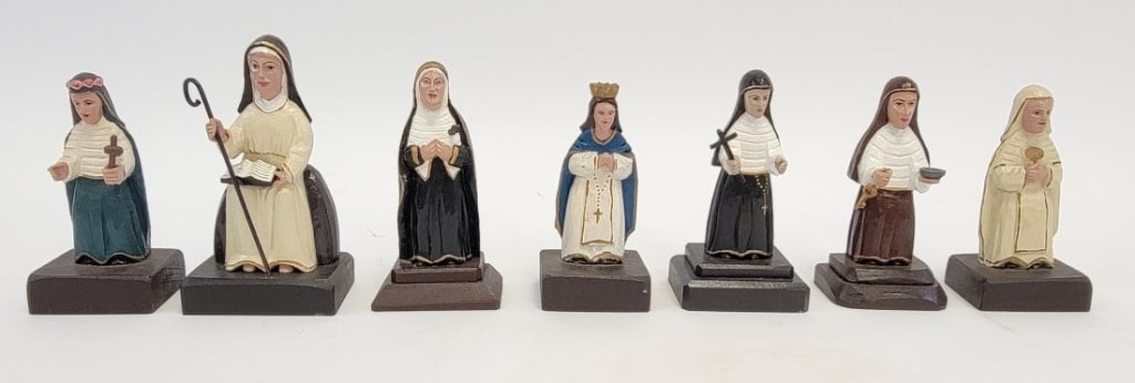 SEVEN ANTONIO AVILES CARVED WOOD SANTOS FIGURES: Lot of seven folk art carved and painted wooden santos figures by Antonio Aviles, Orocovis, PR. Includes Virgen de los Dolores, Santa Clara, Virgen de Rosario Anima Sola, Santa Monica, Santa Marta, Sa