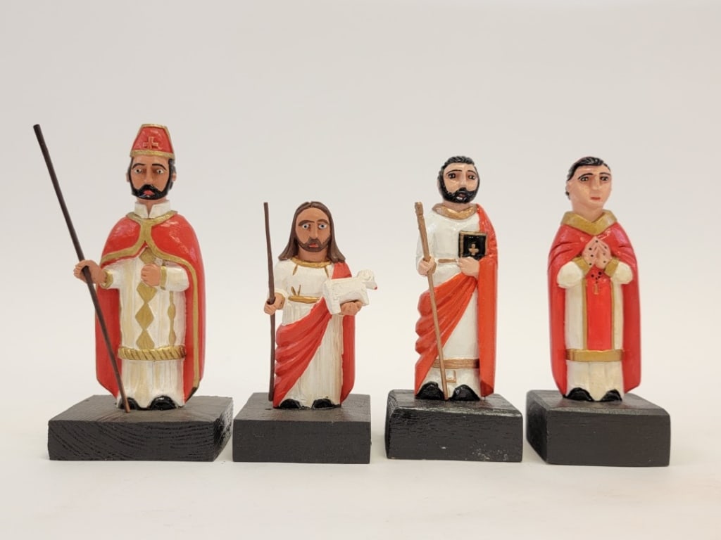 FOUR ROBERTO RIVERA CARVED WOOD SANTOS FIGURES: Lot of four folk art carved and painted wood santos figures by Roberto Rivera, Corozal, PR. Includes San Blas, untitled figure (possibly Jesus), San Marcos, and Santo Domingo. All signed on base. Cond