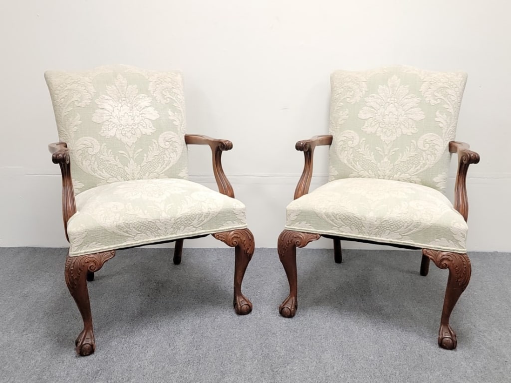PAIR VINTAGE CHIPPENDALE STYLE MAHOGANY ARMCHAIRS: Pair of vintage Chippendale style mahogany armchairs. Each one measuring 37" tall x 26" wide and 28" deep. Condition: minor signs of normal use to brocaded fabric upholstery, scattered nicks and marks