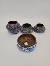 FOUR ANTIQUE PERSIAN ENAMELED COPPER BOWLS