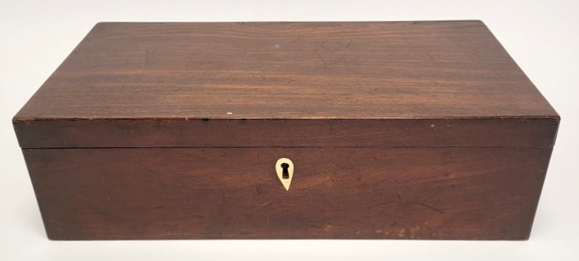 LARGE ANTIQUE MAHOGANY WRITING SLOPE / WRITING BOX: Large antique mahogany writing slope or writing box. Measures 6" tall x 20.75" wide x 10.5" deep. Ivory keyhole escutcheon, interior with several small compartments. Condition: signs of wear and age t